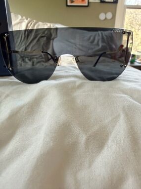 Gucci Rimless Shield Sunglasses in Dark Gray with Gold Accents